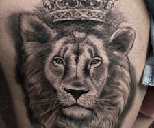 lion crown roses black grey leg tattoo manchester