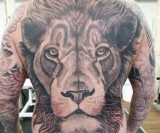 big tattoo lion back piece face portrait secret society tattoo