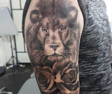 lion tattoo sleeve realism roses black grey manchester