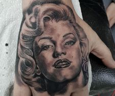 marilyn monroe hand portrait tattoo realism 50s icon