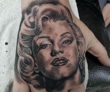 marilyn monroe hand portrait tattoo realism 50s icon
