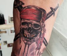 pirates skull caribbean portrait arm sleeve tattoo manchester