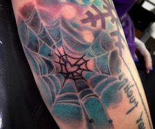 spider web cobweb elbow tattoo colour fantasy tattoo piece manchester