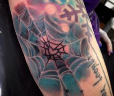 spider web cobweb elbow tattoo colour fantasy tattoo piece manchester